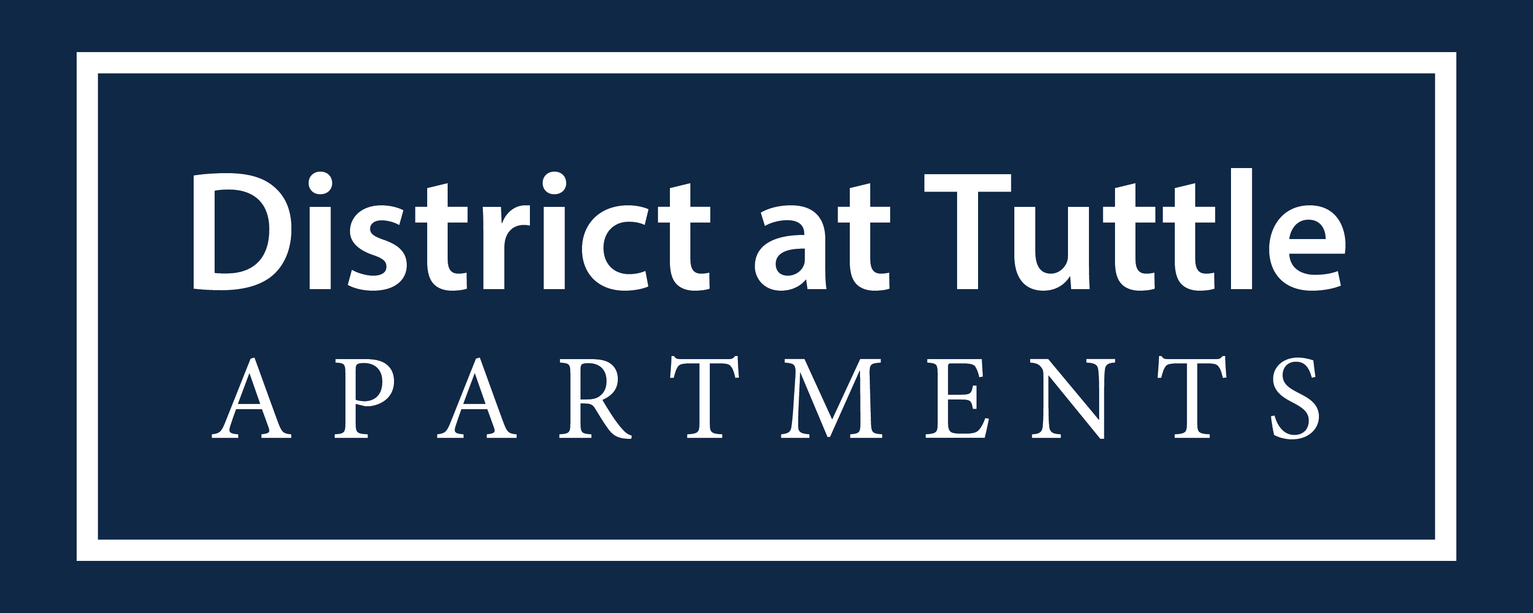 A sign that says District at Tuttle Apartments.